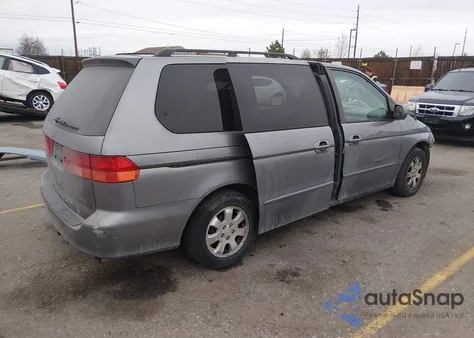 2001 Honda Odyssey Ex z USA, uszkodzony, nr VIN 2HKRL18681H568384